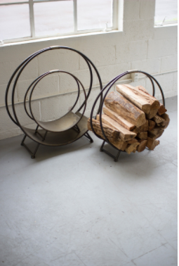 Set of 3 metal firewood racks with circular frames, holds stacked logs, dark finish