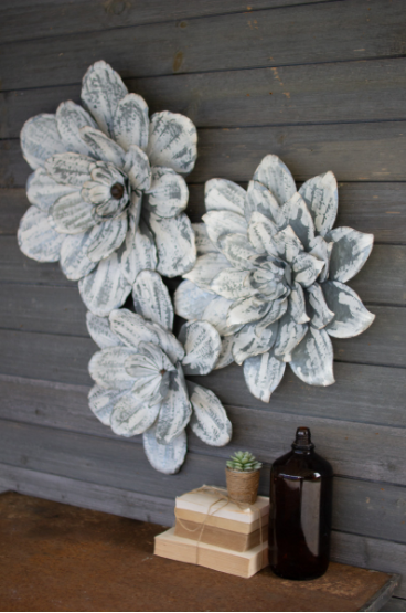 Set of three white-washed wall flowers with layered, textured petals