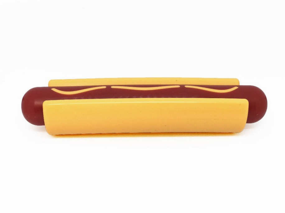 Hot dog-shaped chew toy with yellow center and red ends, side view