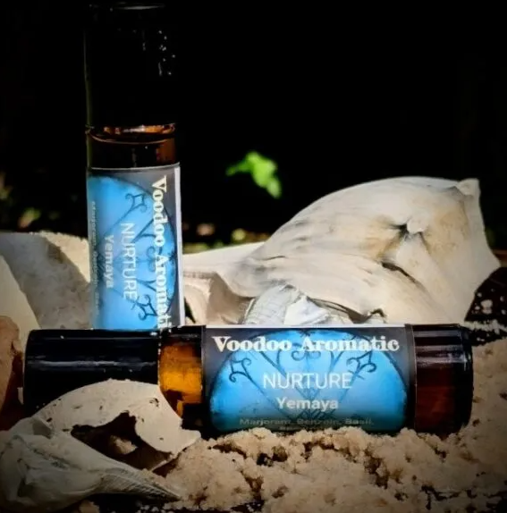 Aromatic glass bottle with blue Yemaya label