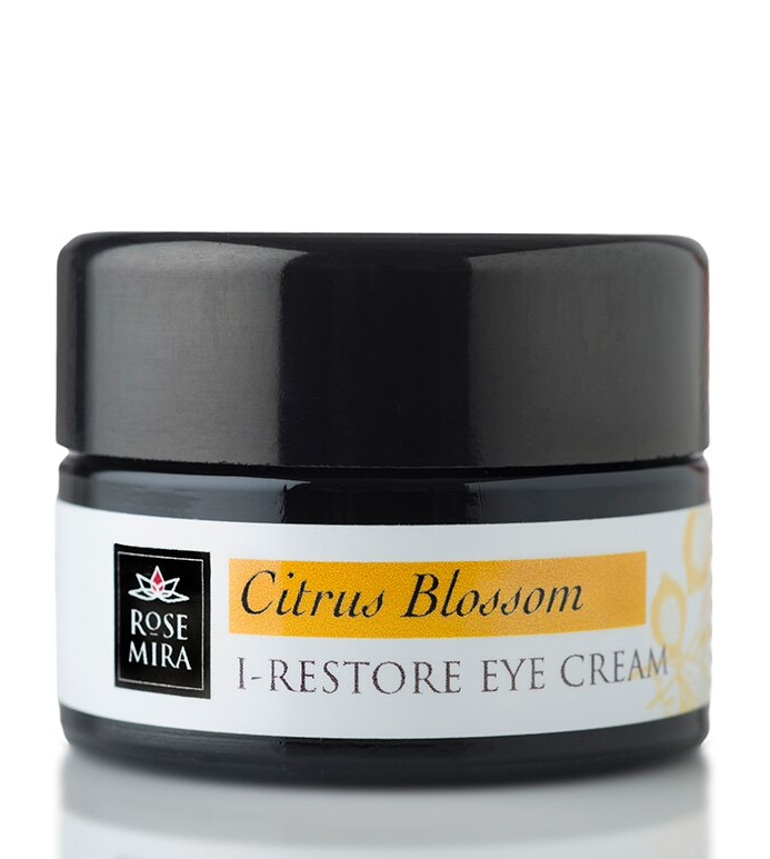 Citrus Blossom eye cream jar with black cap and label reading I-RESTORE EYE CREAM