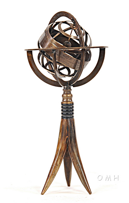 Brass armillary globe decor with dark buffalo horn stand, tripod base