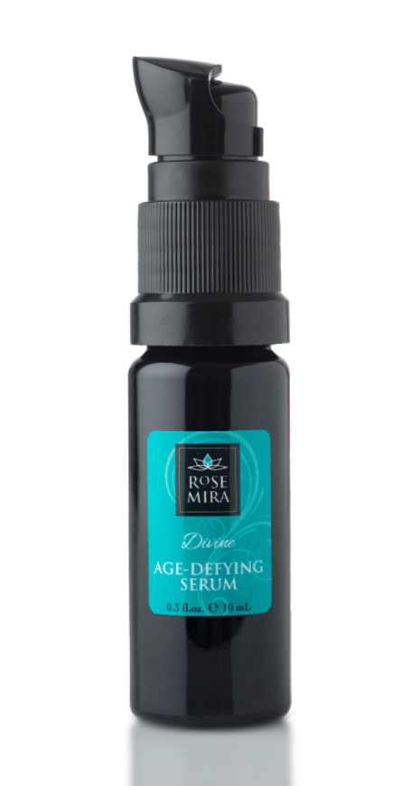 Age-Defying serum pump bottle with Rose Mira teal label, dark glass