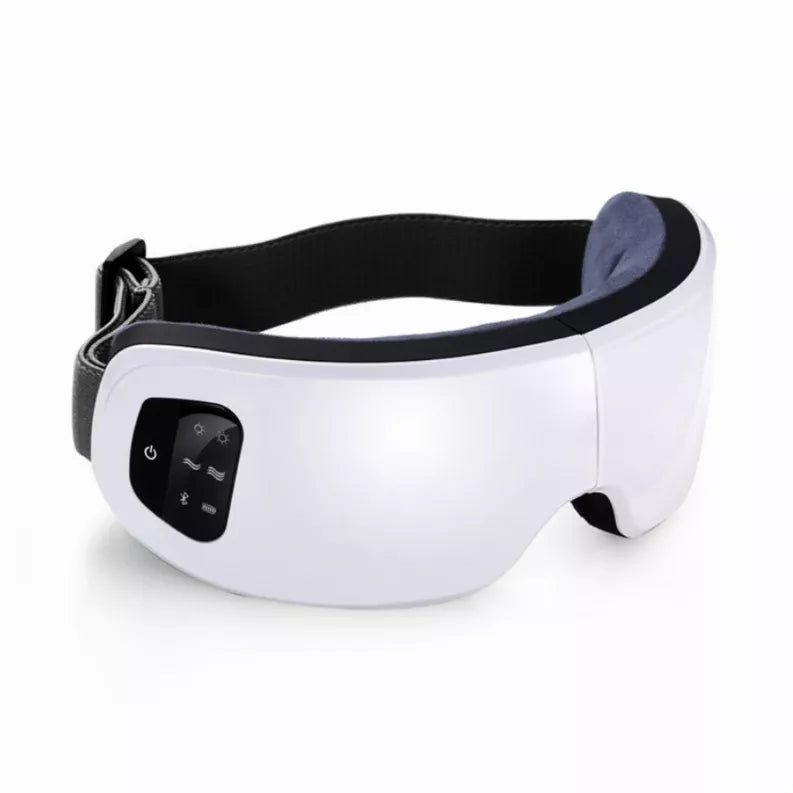 White eye massager with padded strap and button panel, adjustable fit