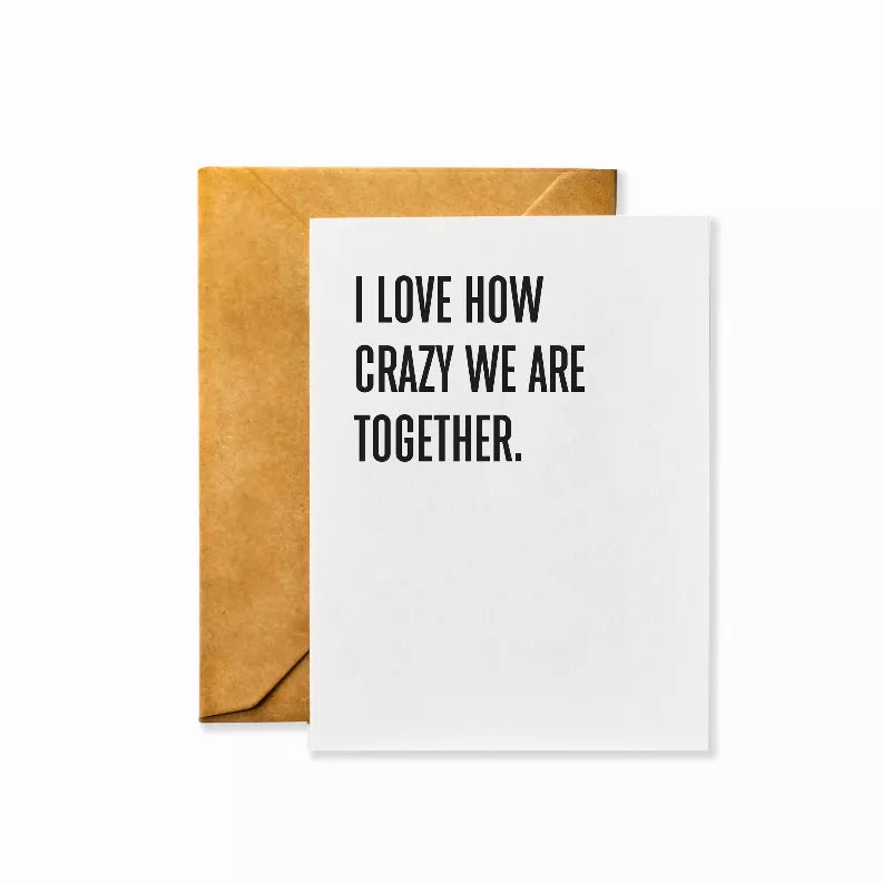 Greeting card with white front and kraft envelope, black quote: I LOVE HOW CRAZY WE ARE TOGETHER.