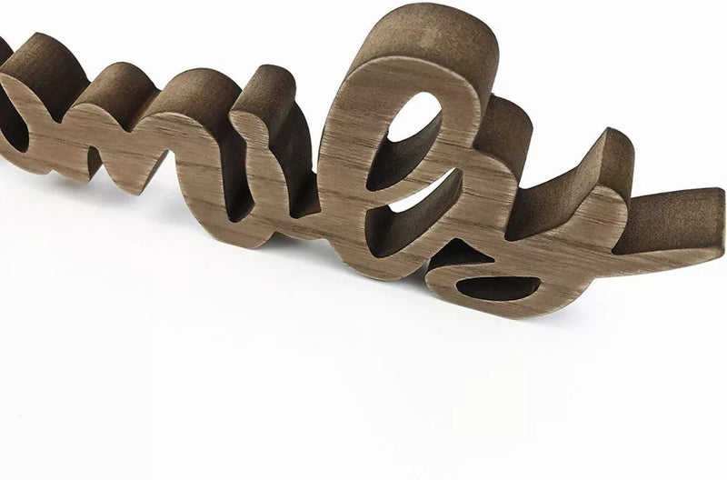 Rustic wooden 'Family' sign with large cursive letters, freestanding