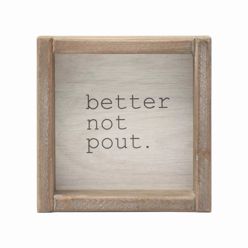 Brown wood framed wall sign plaque with "better not pout." printed on panel