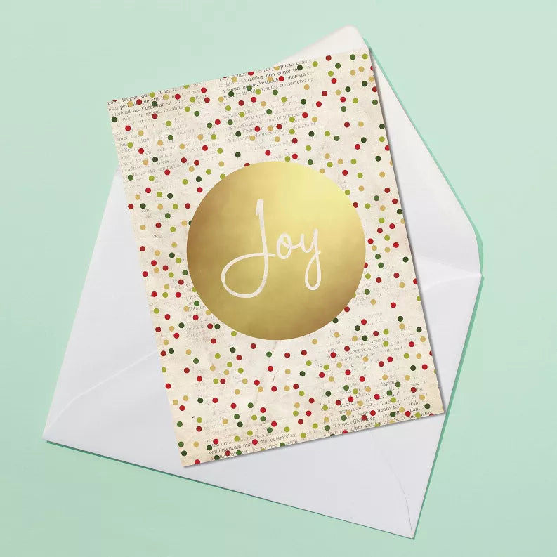 Christmas card with white cover, multicolor dots, and a gold circle reading "Joy"