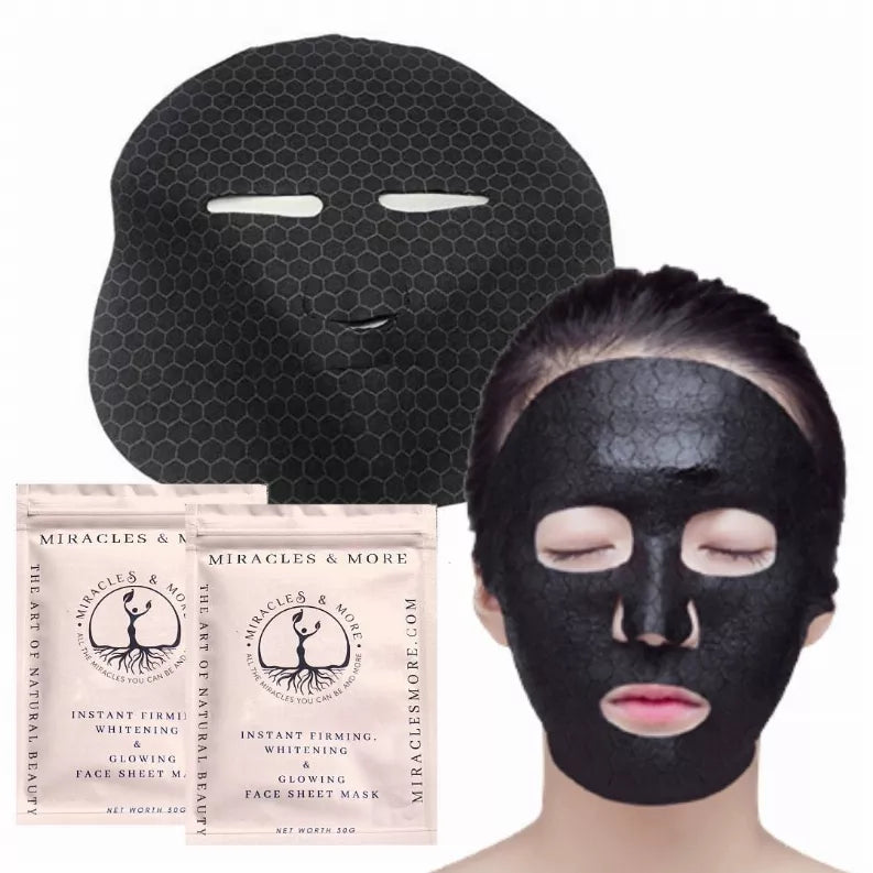 Black hex-pattern face sheet mask on face, with pink-and-white box packaging