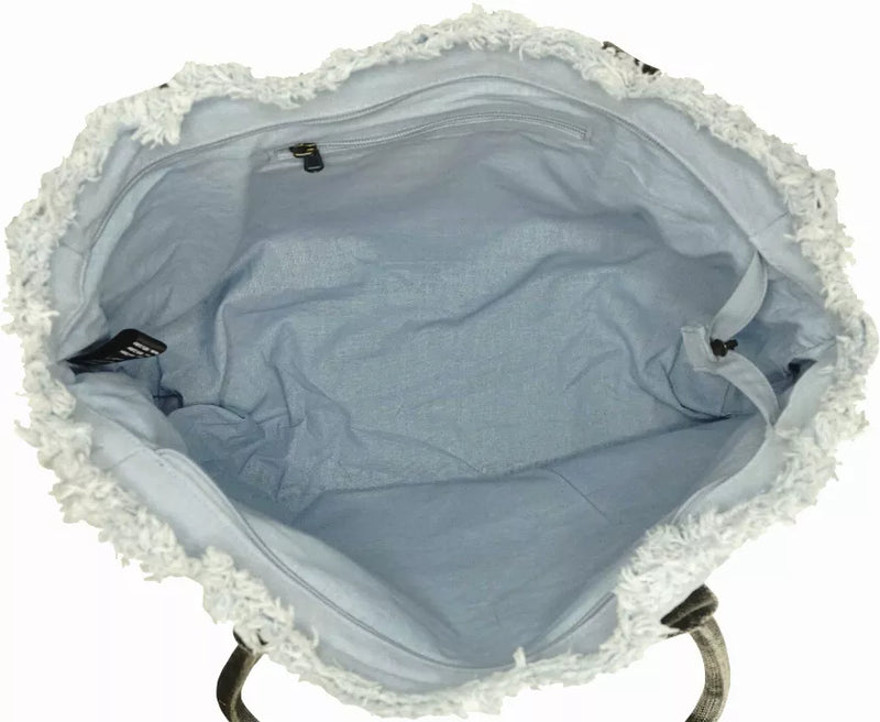 Light blue tote bag interior with zippered top and lace-trimmed opening