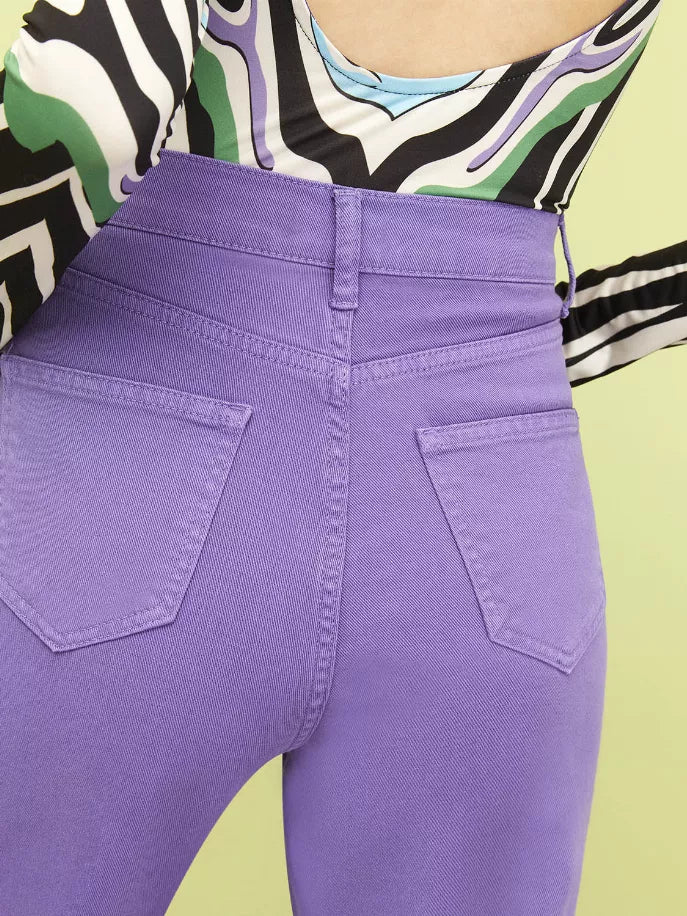 Purple wide-leg jeans with curved front seam and flap front pockets