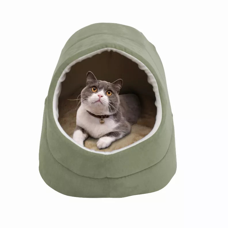 GOOPAWS cat cave bed in olive green with round tunnel opening; gray cat resting inside