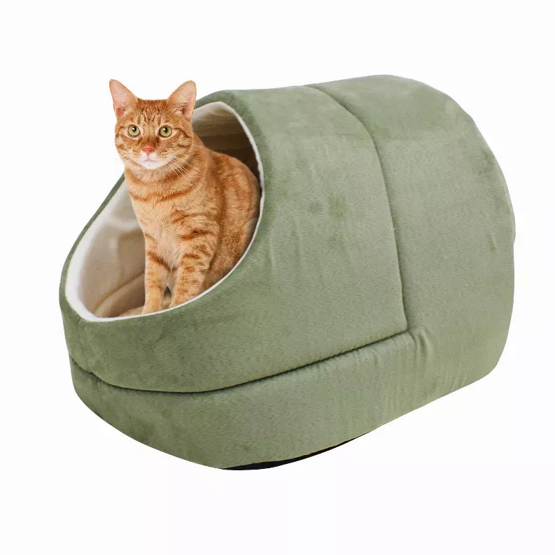 GOOPAWS cat cave bed in olive green with round entrance; orange tabby cat sitting inside
