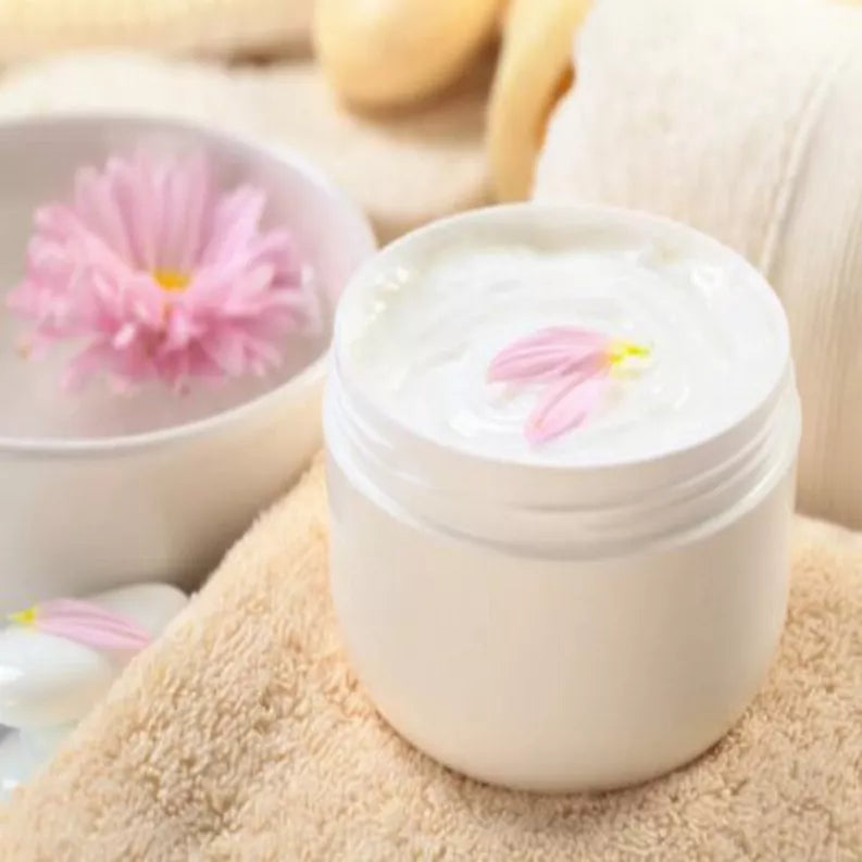 Goat milk and honey lotion jar with white container and pastel floral lid