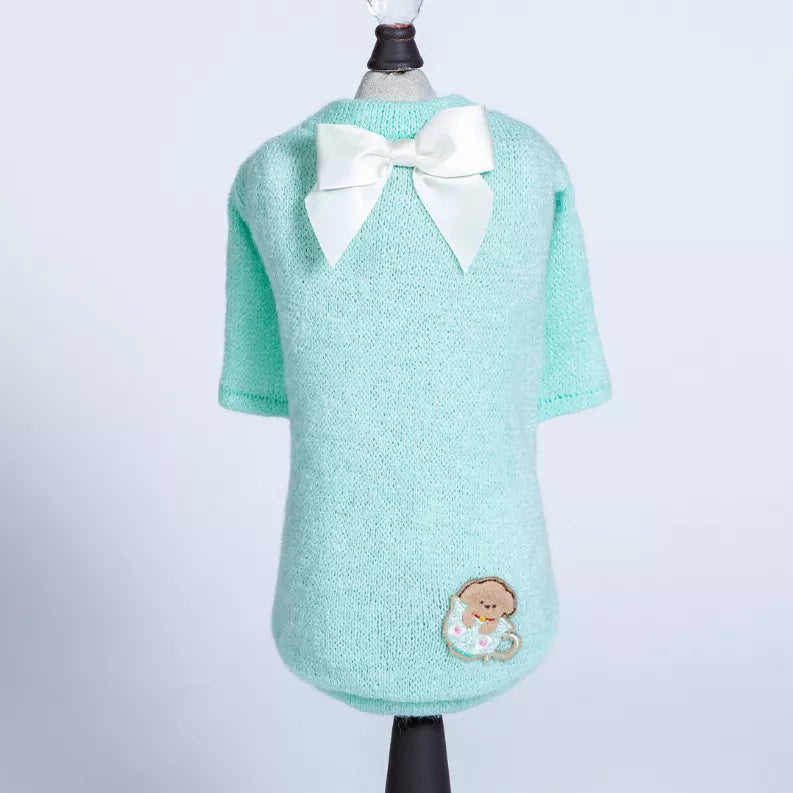 Mint short-sleeve sweater with white bow collar and embroidered teacup character patch