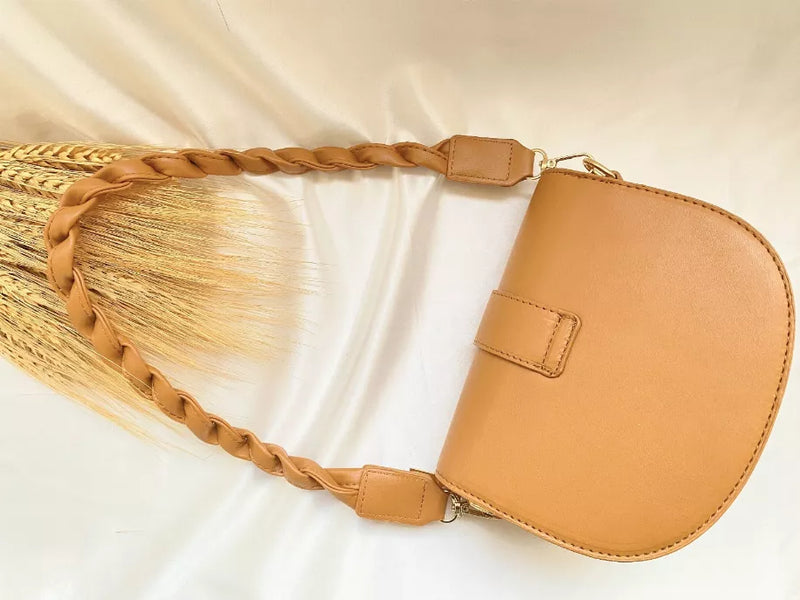 Hallie shoulder bag, rounded crossbody shape with braided strap and front flap