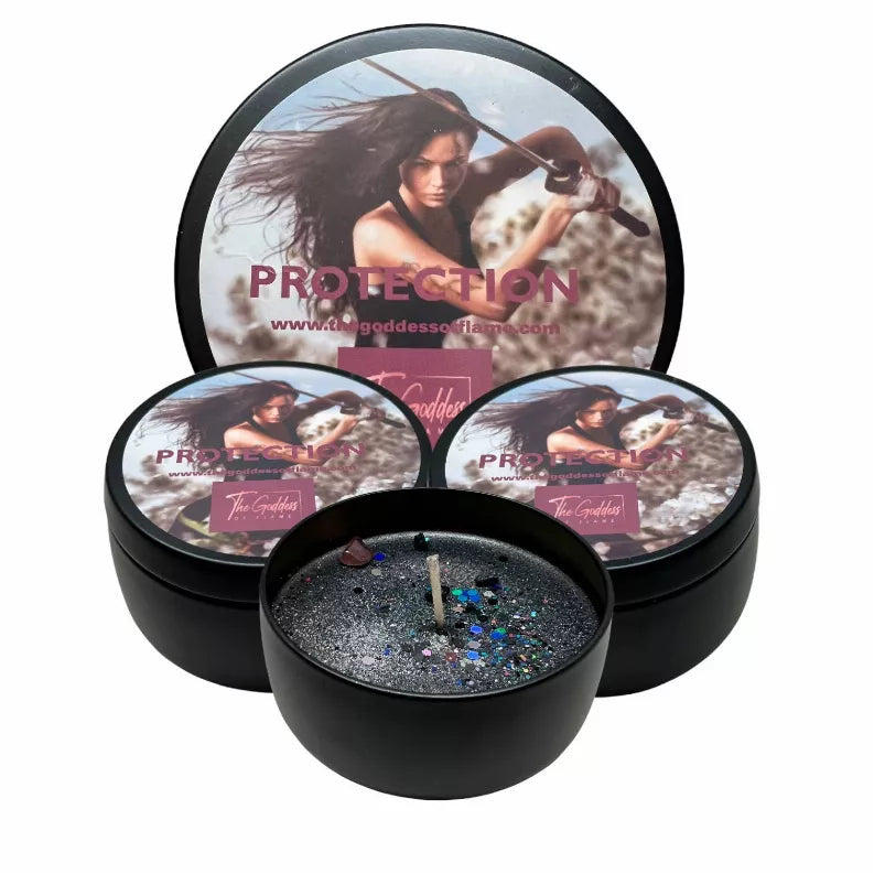 Black candle tins (set of 3) with lid graphics; one open with glitter wax