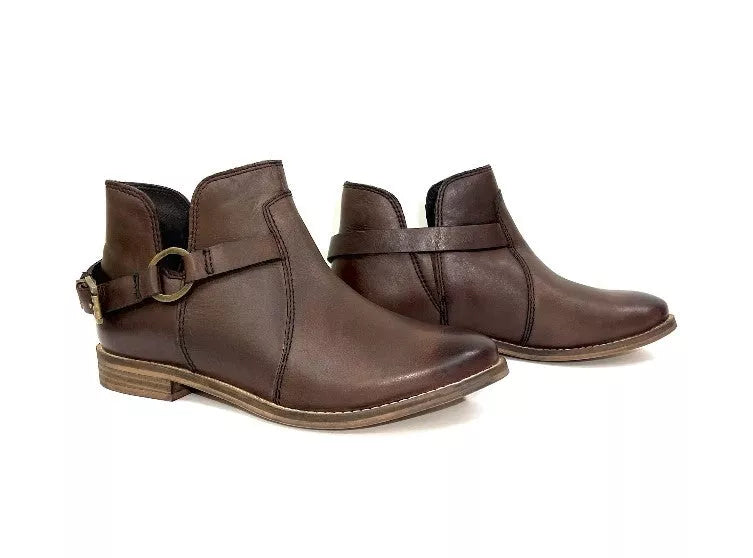 Brown vintage ankle booties, side view, buckle strap and stitched upper