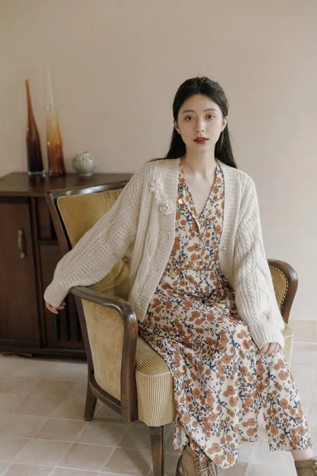 Ivory crochet cardigan with long sleeves and open front, textured cable-knit look