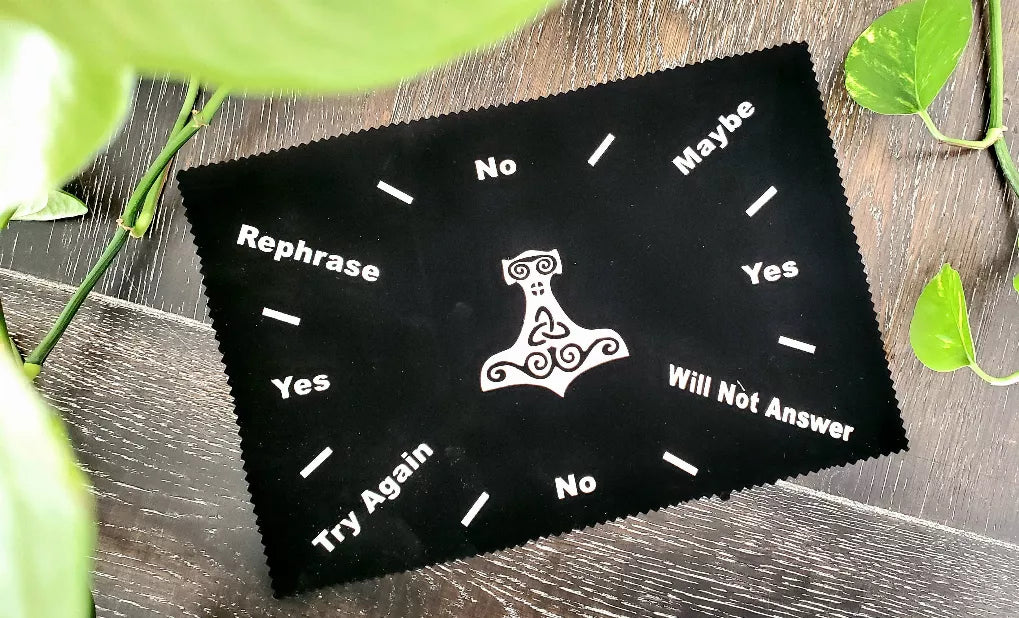 Black pendulum mat with hammer icon and yes/no lines and Will Not Answer text