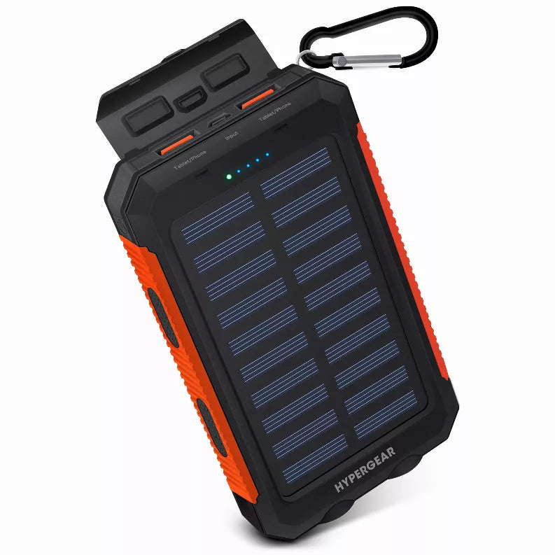 Black solar power bank with orange sides, built-in solar panel and LED battery indicator