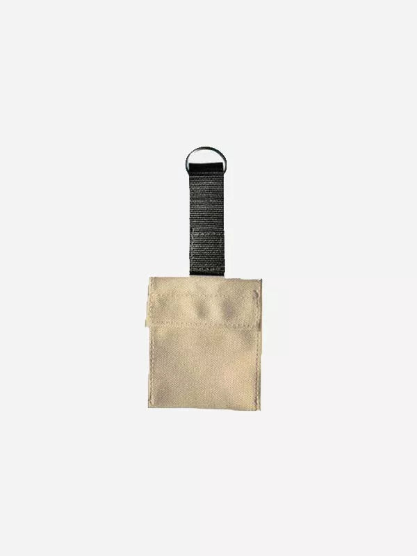 Tan auxiliary wallet with black strap loop and rectangular front pocket