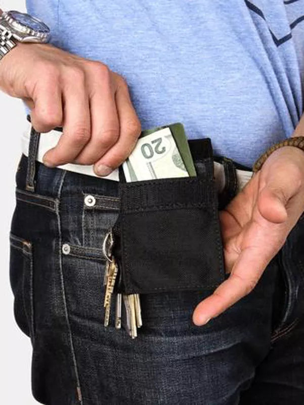 Black auxiliary wallet on belt with cash and keys pulled from pocket