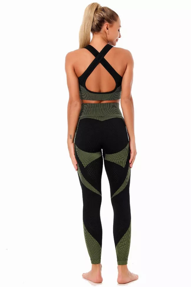 Black and olive striped yoga leggings with padded open-back bra, crisscross straps