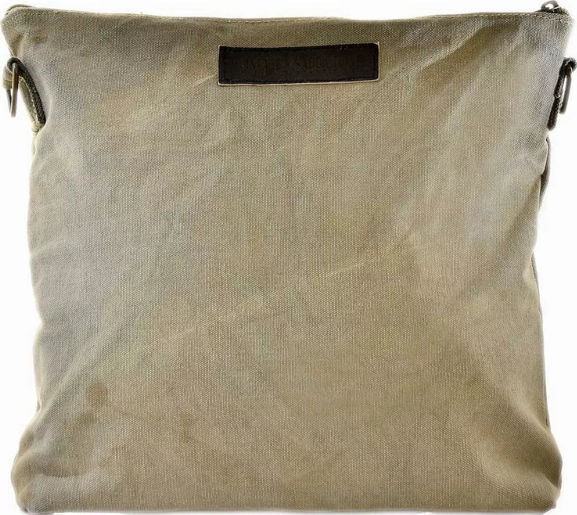 Recycled crossbody bag with black label patch and reinforced side eyelets