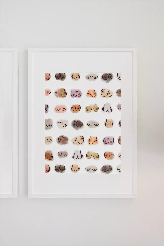 Framed wall art print with white frame and repeated cute character face icons