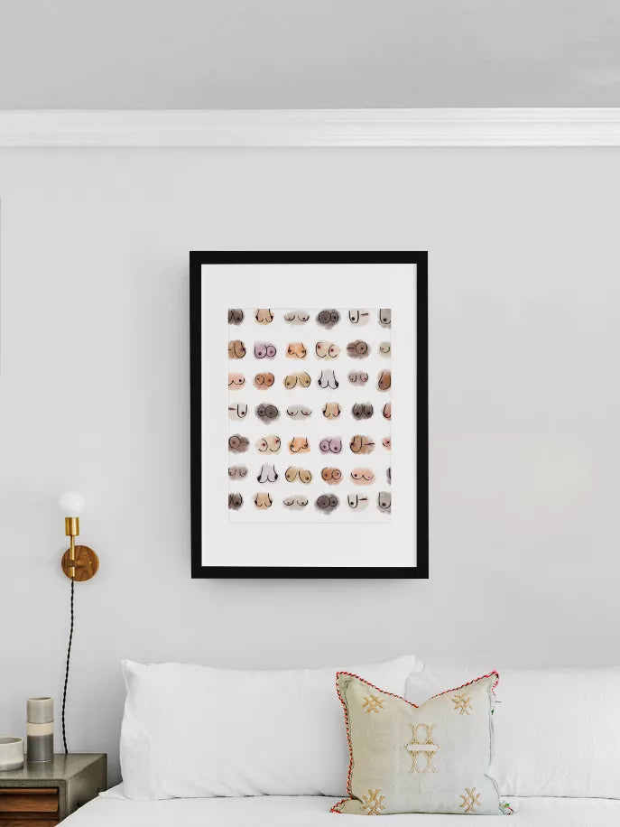 Framed wall art print with black frame, square mat, repeated cartoon face icons