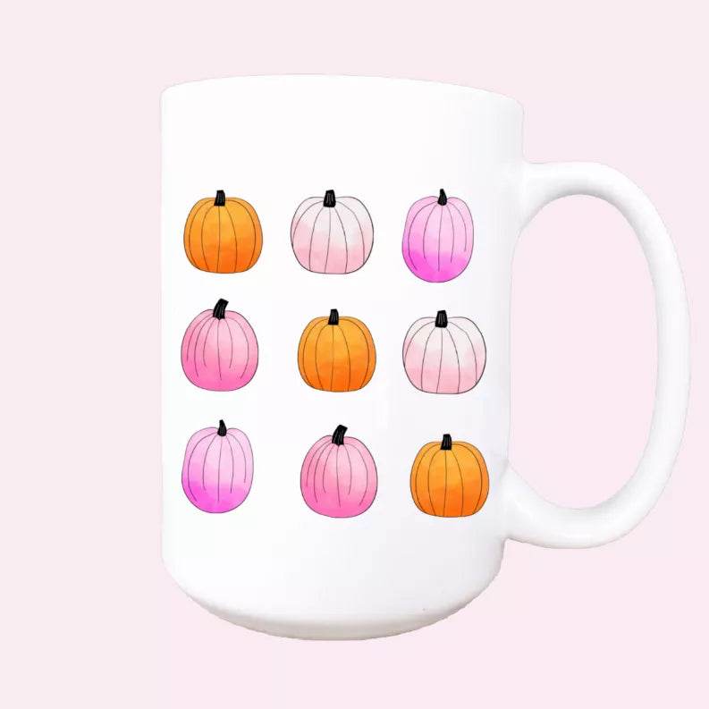 White ceramic coffee mug with multicolor pumpkin graphics, 15oz capacity