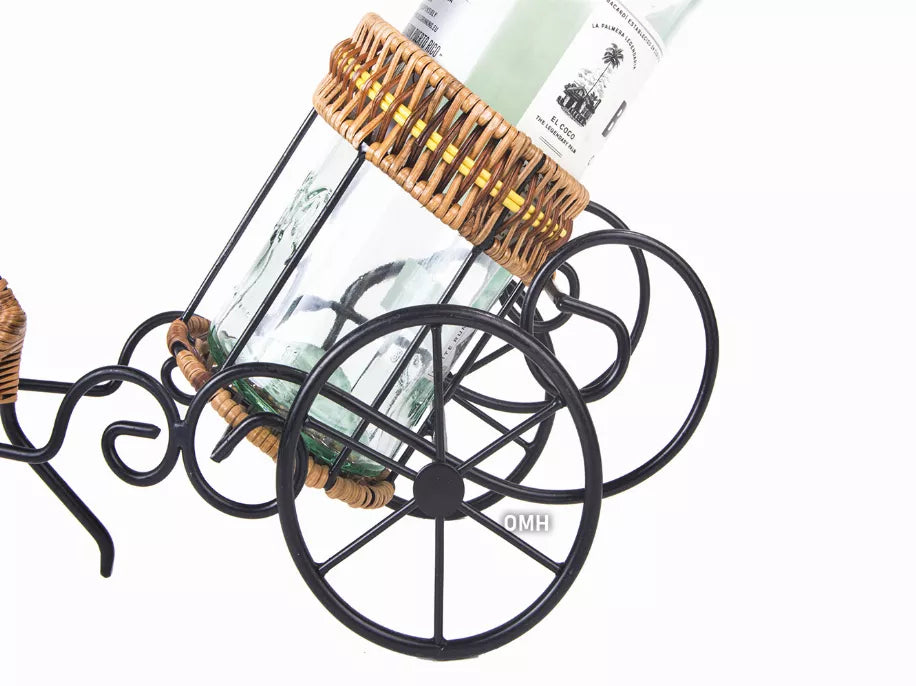 Close-up rickshaw wine holder cart showing bottle, wicker basket, and black wheels
