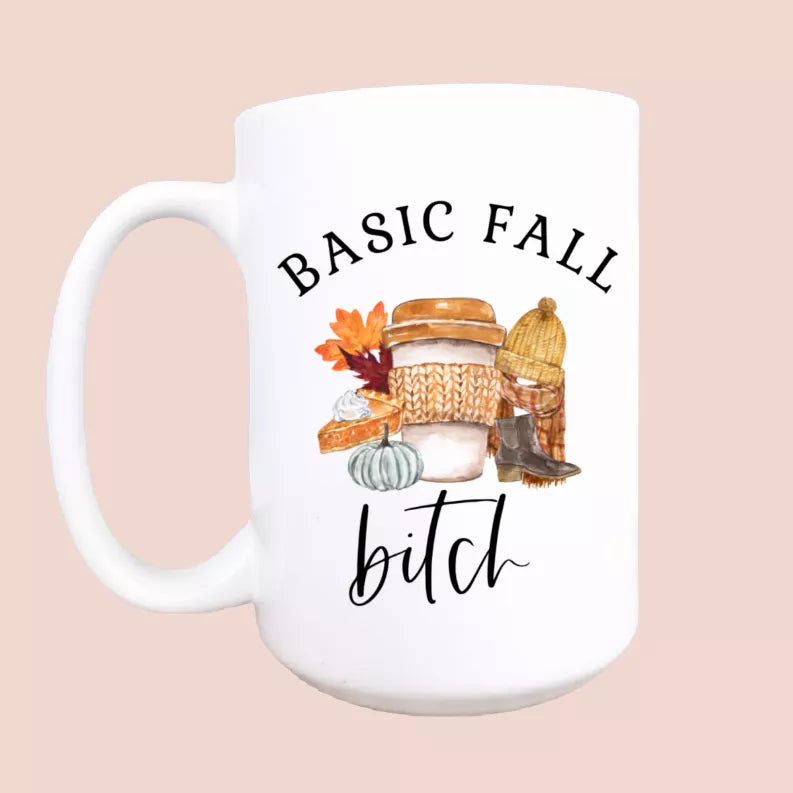 15oz white ceramic coffee mug with Basic Fall text and autumn cottage illustration