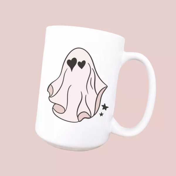 White ceramic coffee mug with cute ghost face and heart details