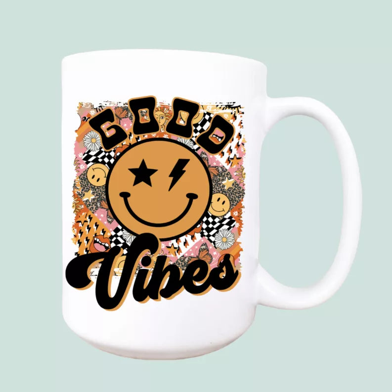Retro ceramic coffee mug, white with smiley “Vibes” graphic and star/bolt design