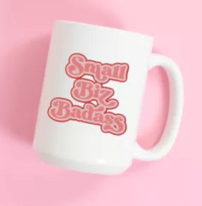 White ceramic coffee mug with pink "Small Biz Badass" text print