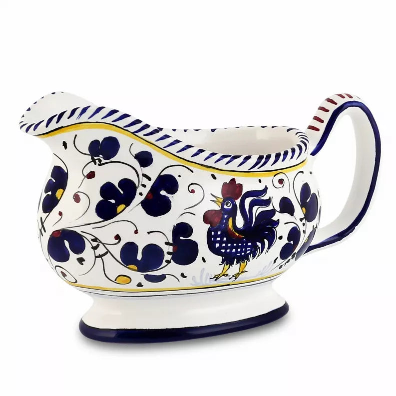 Deruta-style ceramic sauce boat side view with blue rooster motif and loop handle