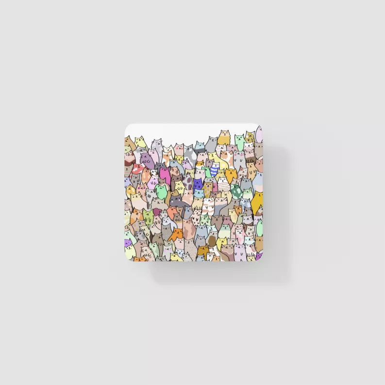 Cat-themed square coaster with multicolor kitten faces pattern