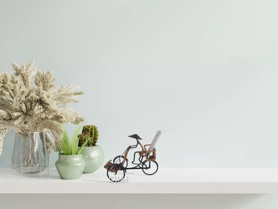 Woven rickshaw-style card holder with tiny tricycle and black details