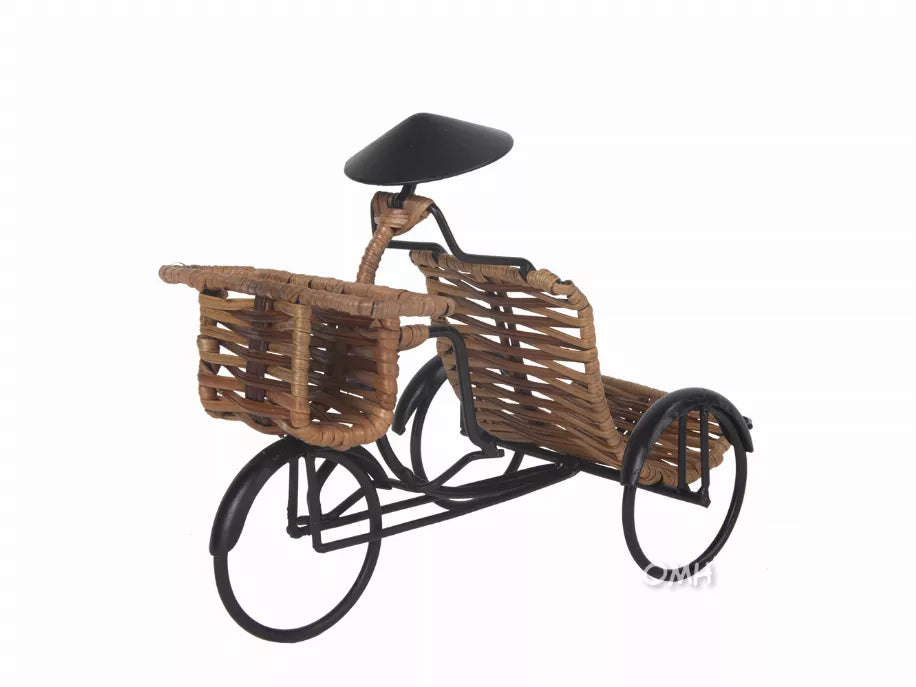 Woven rickshaw card holder with front basket, black handlebars, and wheels