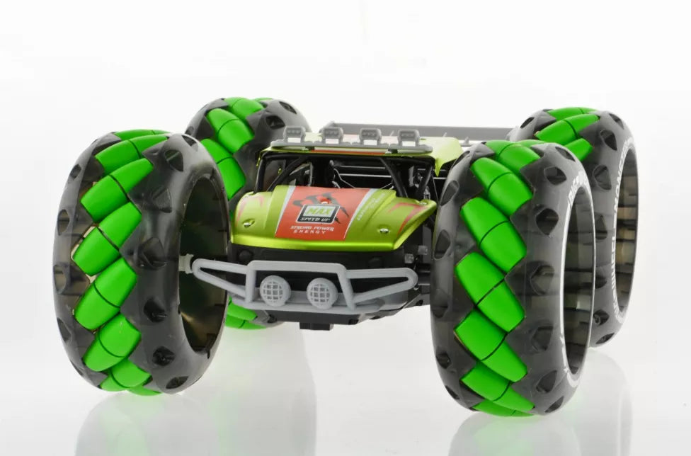 1:10 scale monster truck toy with green tread wheels and lighted front grille
