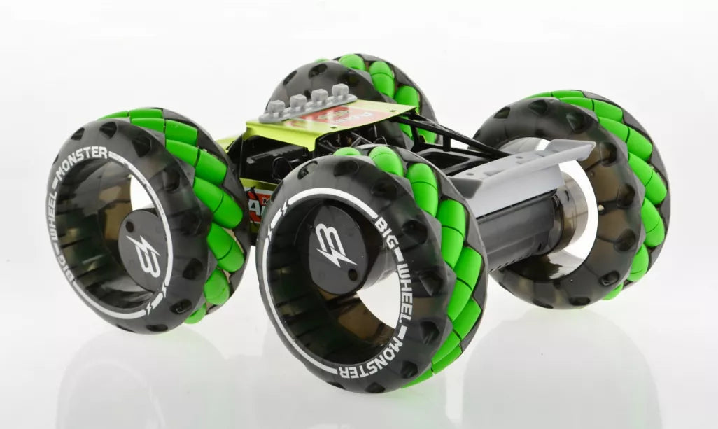 1:10 scale monster truck toy side view with green wheels and dual side exhaust