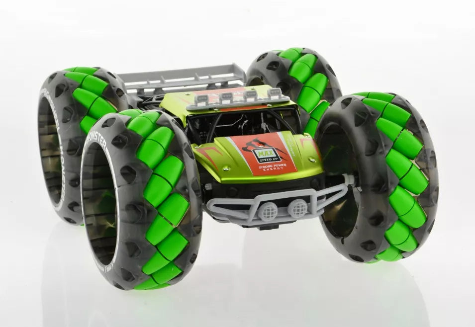 1:10 scale monster truck toy front view with green wheel segments and silver bumper