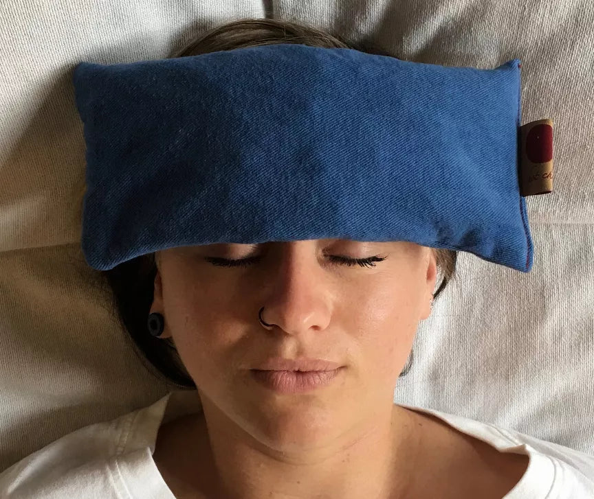 Hot Cherry eye pillow, plush blue rectangular pad with fabric tag