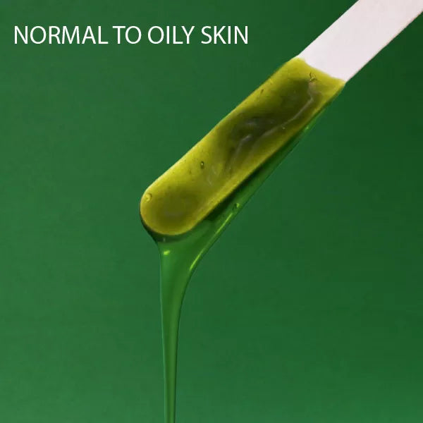 Green hard wax ribbon, Normal to oily skin, thick gel texture in scoop view