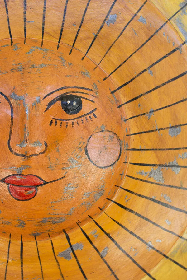 Hand-hammered recycled metal sun face wall decor with painted facial features, multicolor