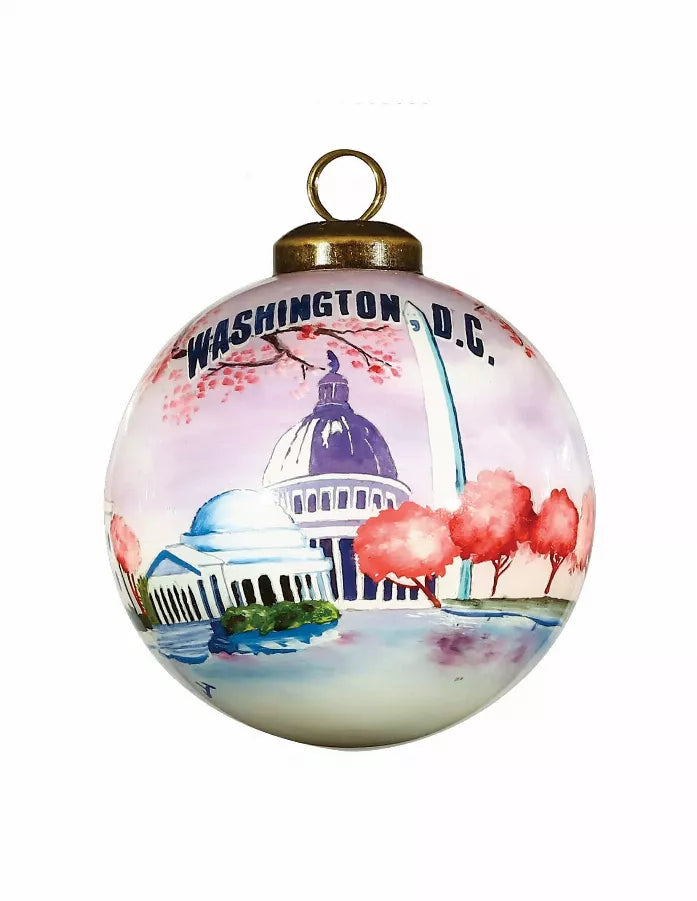 Hand-painted glass ball ornament with Washington D.C. skyline and red trees