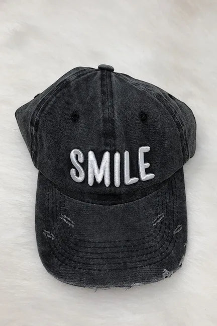 Dark gray distressed ball cap with embroidered SMILE logo, curved brim, eyelets