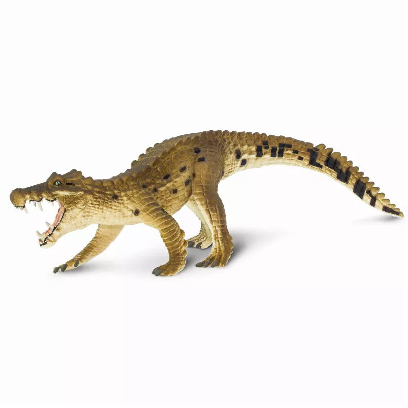 Kaprosuchus dinosaur figure, brown crocodile-like body with open mouth and tail